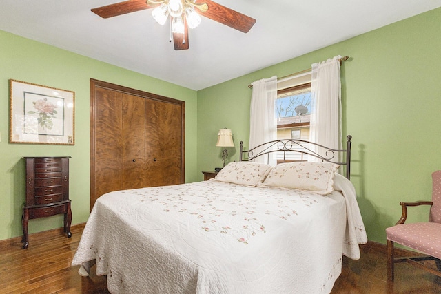 bedroom featuring wood finished floors, a closet, and ceiling fan