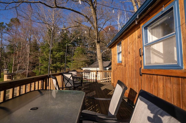 6294 Rock Rd, Lake, MI 48632 - wooden deck featuring outdoor dining area
