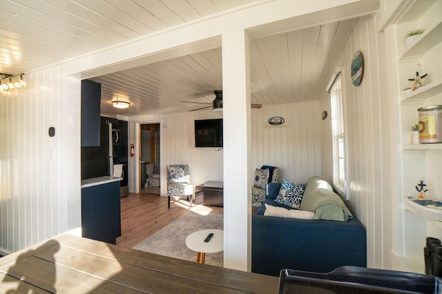 6294 Rock Rd, Lake, MI 48632 - living area with wood finished floors, a ceiling fan, and wooden ceiling