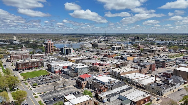 view of urban area featuring a large body of water