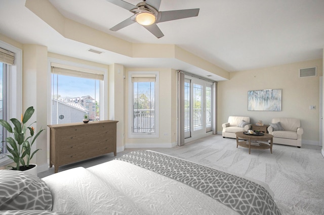 200 Lake St Unit 4B, Saint Joseph, MI 49085 - bedroom with baseboards, light carpet, access to exterior, and ceiling fan