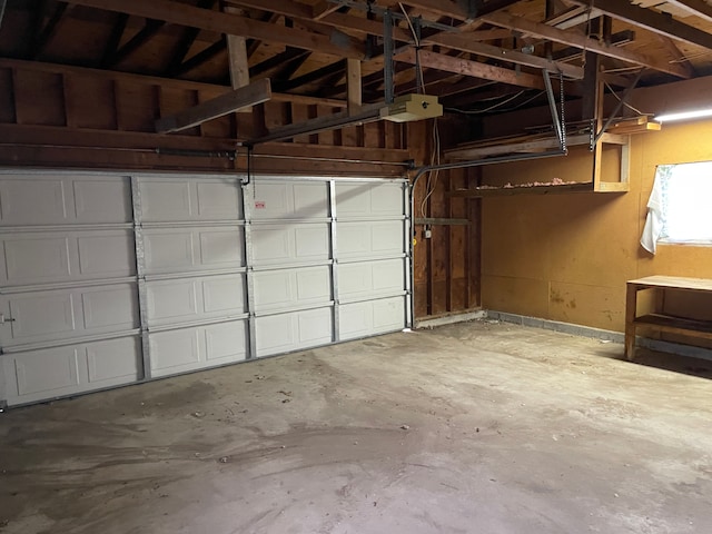 9550 Colgate Ave, Clarkston, MI 48348 - garage featuring a garage door opener