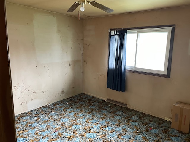9550 Colgate Ave, Clarkston, MI 48348 - spare room featuring ceiling fan, carpet floors, and baseboards