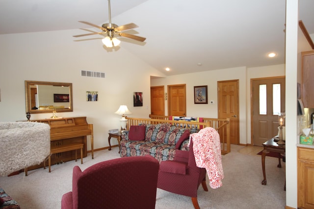 living area with lofted ceiling, light carpet, ceiling fan, recessed lighting, and baseboards