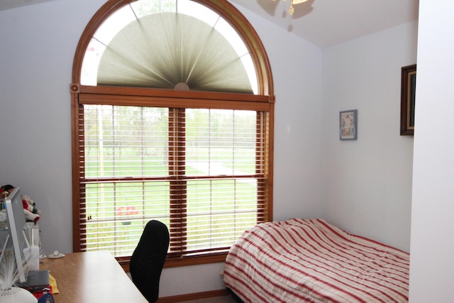 bedroom featuring a desk and a ceiling fan