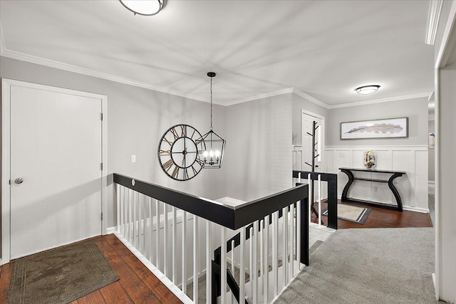 1160 S Baldwin Rd, Lake Orion, MI 48360 - hall featuring an upstairs landing, wood-type flooring, a chandelier, crown molding, and wainscoting