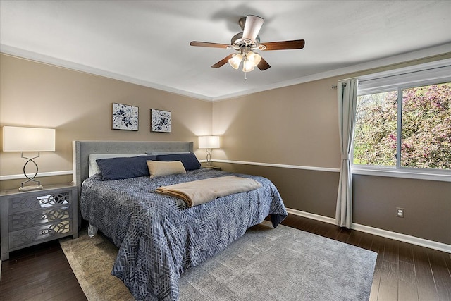 1160 S Baldwin Rd, Lake Orion, MI 48360 - bedroom with hardwood / wood-style floors, baseboards, ceiling fan, and crown molding