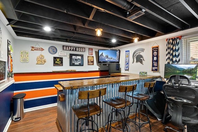 1160 S Baldwin Rd, Lake Orion, MI 48360 - indoor dry bar featuring wood finished floors, baseboards, and crown molding