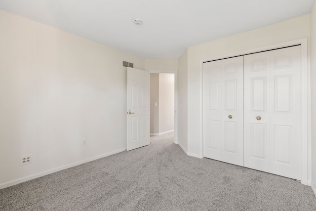 42036 Saratoga Cir, Canton, MI 48187 - unfurnished bedroom featuring carpet flooring, baseboards, and a closet