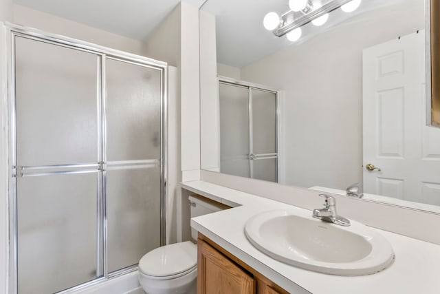 42036 Saratoga Cir, Canton, MI 48187 - bathroom featuring a stall shower, toilet, and vanity
