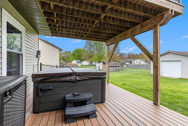 wooden deck featuring a hot tub, an outbuilding, and a shed