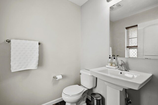 72597 Faye Ct, South Haven, MI 49090 - bathroom featuring toilet and baseboards
