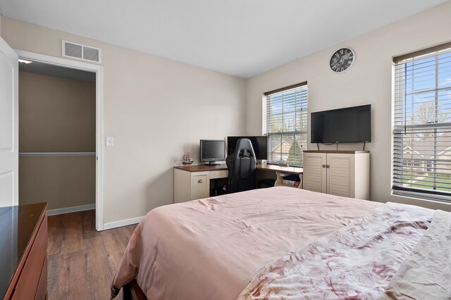 72597 Faye Ct, South Haven, MI 49090 - bedroom featuring wood finished floors and baseboards