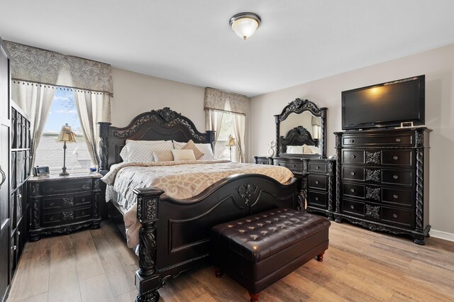 72597 Faye Ct, South Haven, MI 49090 - bedroom featuring wood finished floors