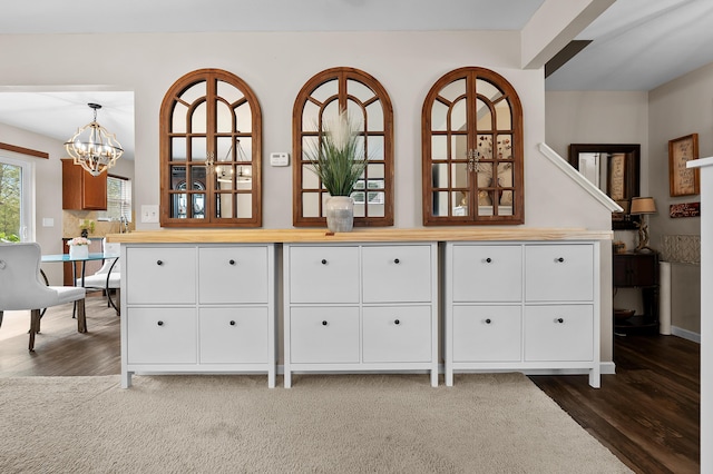 72597 Faye Ct, South Haven, MI 49090 - detailed view of a chandelier, wood finished floors, and carpet flooring