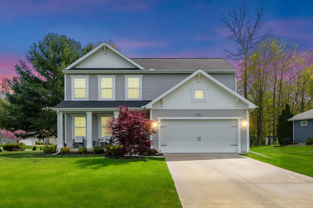 72597 Faye Ct, South Haven, MI 49090 - traditional-style home featuring driveway, a front lawn, board and batten siding, and a garage