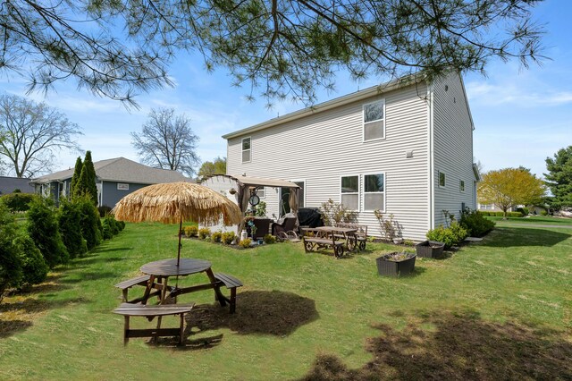 72597 Faye Ct, South Haven, MI 49090 - back of house featuring a yard