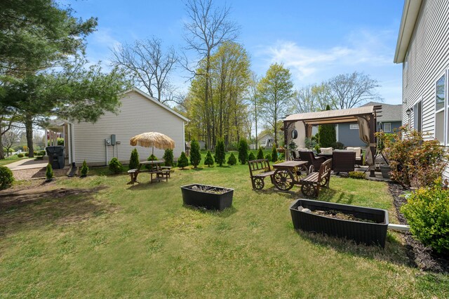72597 Faye Ct, South Haven, MI 49090 - view of grassy yard featuring a gazebo and an outdoor living space with a fire pit