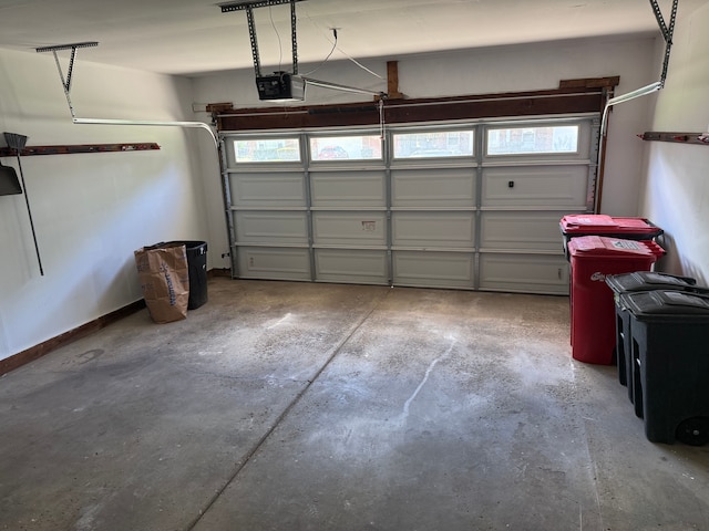 garage featuring a garage door opener