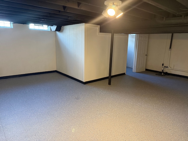 basement featuring baseboards