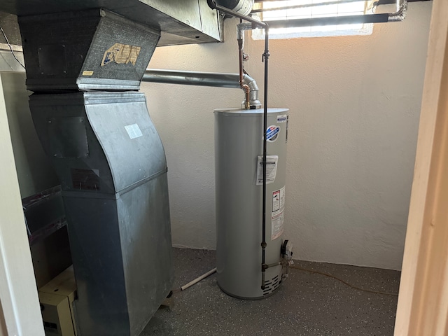 utility room with gas water heater and heating unit