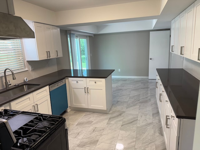 kitchen featuring dishwasher, a sink, a peninsula, gas stove, and white cabinets