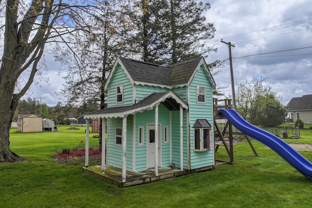 view of playground featuring a lawn