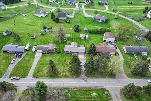 aerial view of property's location featuring nearby suburban area
