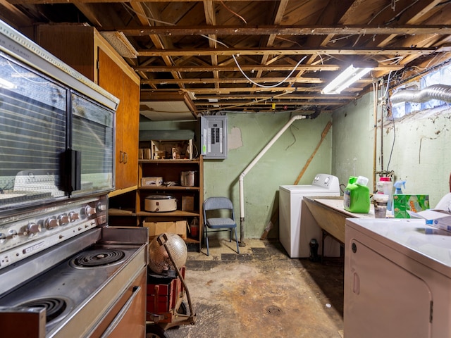24730 Ridgedale St, Oak Park, MI 48237 - unfinished basement featuring washer and dryer and electric panel