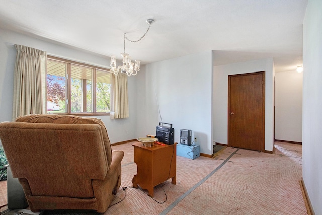 office featuring carpet floors, a chandelier, and baseboards