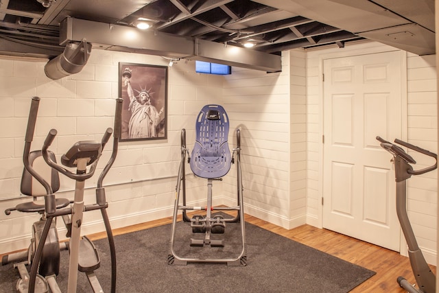 exercise area with wood finished floors