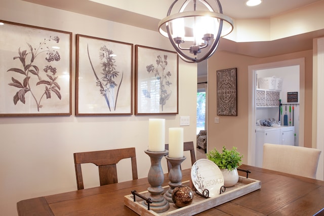 dining area with separate washer and dryer, a chandelier, and recessed lighting