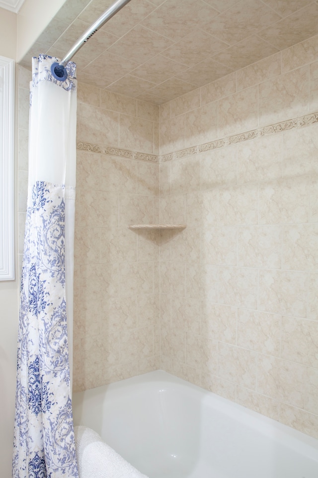 full bathroom with shower / bathtub combination with curtain