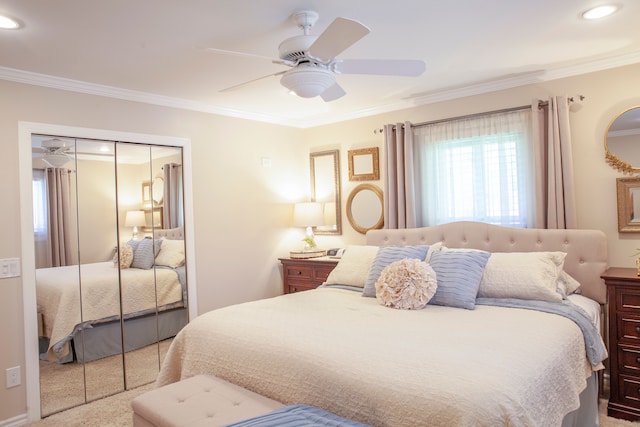 carpeted bedroom featuring crown molding, a closet, a ceiling fan, and recessed lighting