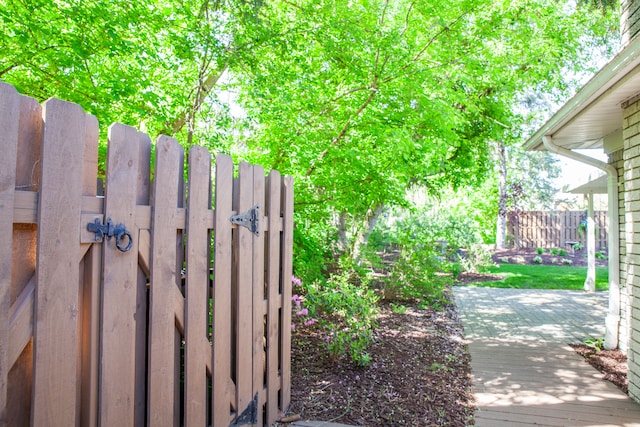 exterior space with fence and a gate