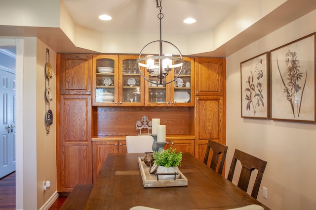 dining area with a chandelier and recessed lighting