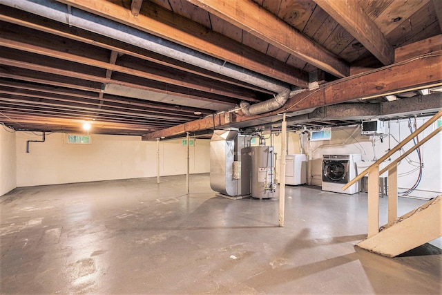 2 Fort St, Niles, MI 49120 - basement with separate washer and dryer, water heater, and heating unit
