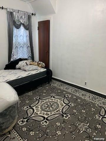 8097 Marlowe St, Detroit, MI 48228 - bedroom featuring baseboards