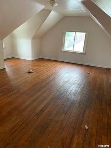8097 Marlowe St, Detroit, MI 48228 - bonus room with dark wood finished floors and vaulted ceiling