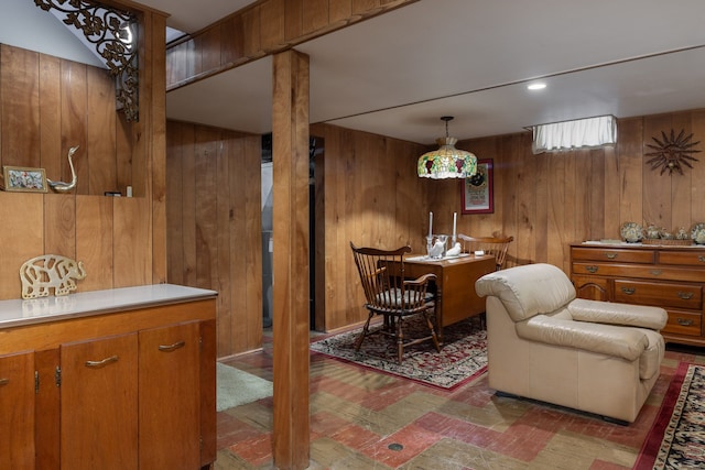 dining area with wood walls