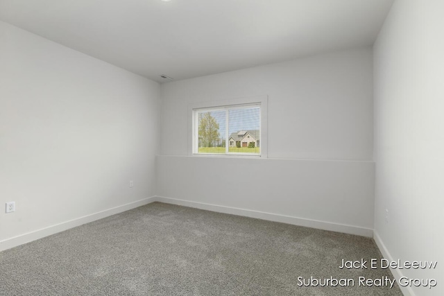12840 Ridgedale Dr, Allendale, MI 49401 - carpeted spare room featuring baseboards