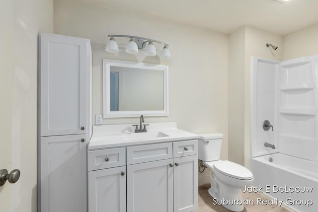 12840 Ridgedale Dr, Allendale, MI 49401 - bathroom with toilet, vanity, and bathtub / shower combination