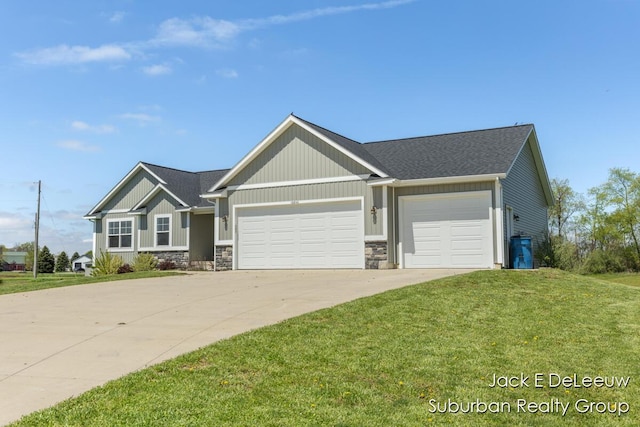 12840 Ridgedale Dr, Allendale, MI 49401 - craftsman-style home with a front lawn, a garage, stone siding, driveway, and a shingled roof