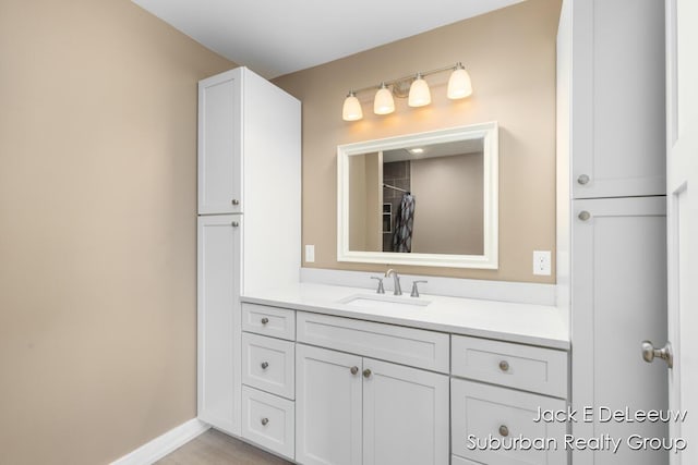 12840 Ridgedale Dr, Allendale, MI 49401 - full bath featuring vanity and baseboards