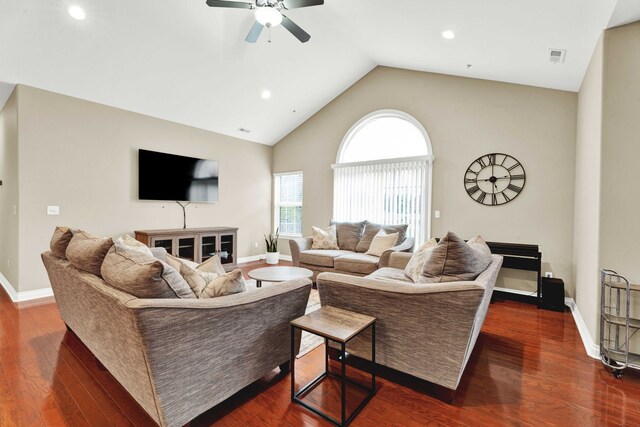 living room with ceiling fan, recessed lighting, baseboards, dark wood finished floors, and high vaulted ceiling