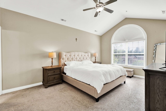bedroom with baseboards, light carpet, lofted ceiling, and a ceiling fan