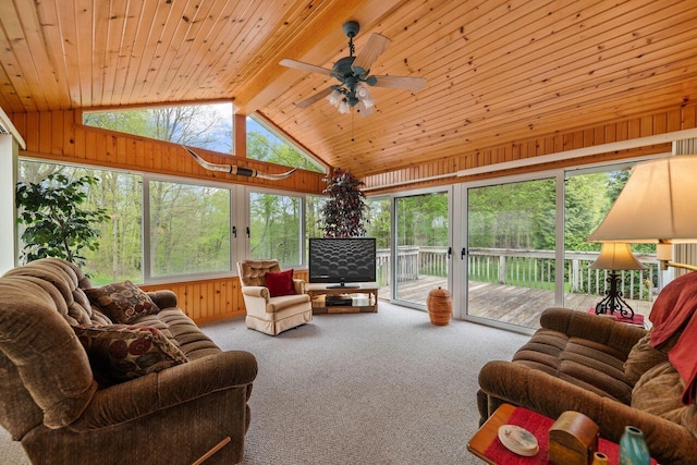 carpeted living room featuring ceiling fan and wooden ceiling