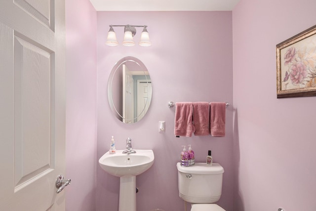 4261 Merriman Loop, Howell, MI 48843 - bathroom with toilet and a sink