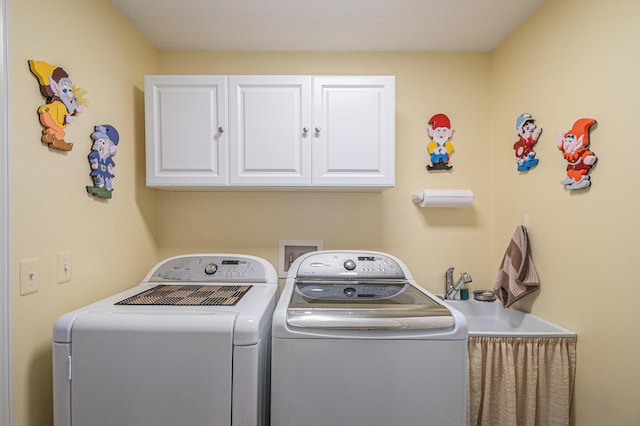4261 Merriman Loop, Howell, MI 48843 - clothes washing area featuring independent washer and dryer and cabinet space