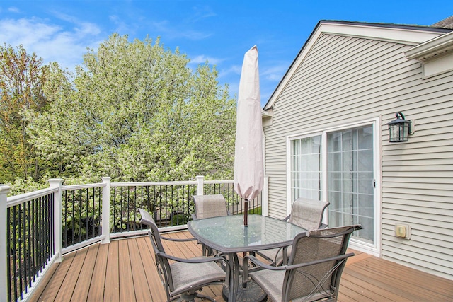 4261 Merriman Loop, Howell, MI 48843 - wooden deck with outdoor dining area